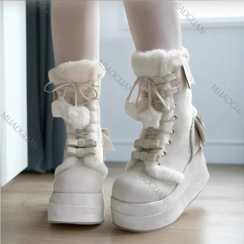 Eprolo Fiyonk detaylı peluş platform kar botu with bow accents, warm plush lining, and sturdy rubber sole for winter wear.