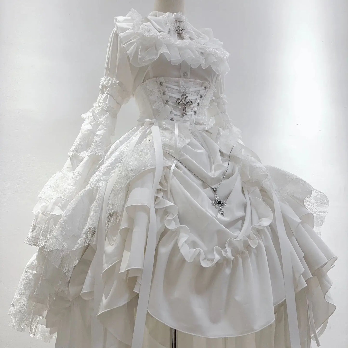Victorian Gothic black dress with ruffled details and lace accents, featuring a fitted bodice and flowing skirt from eprolo.