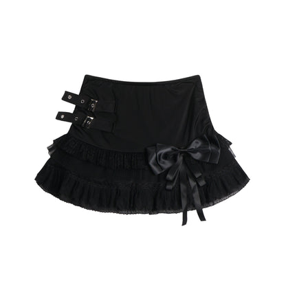 Eprolo low-rise bow mini skirt in black fabric, stylish and fitted, shown on a model.