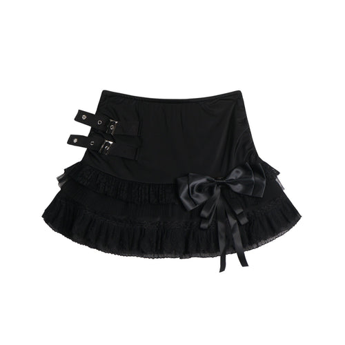 Eprolo low-rise bow mini skirt in black fabric, stylish and fitted, shown on a model.