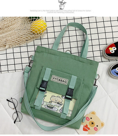 Transparent canvas shoulder bag with colorful printed design, featuring a spacious interior and adjustable strap by eprolo.
