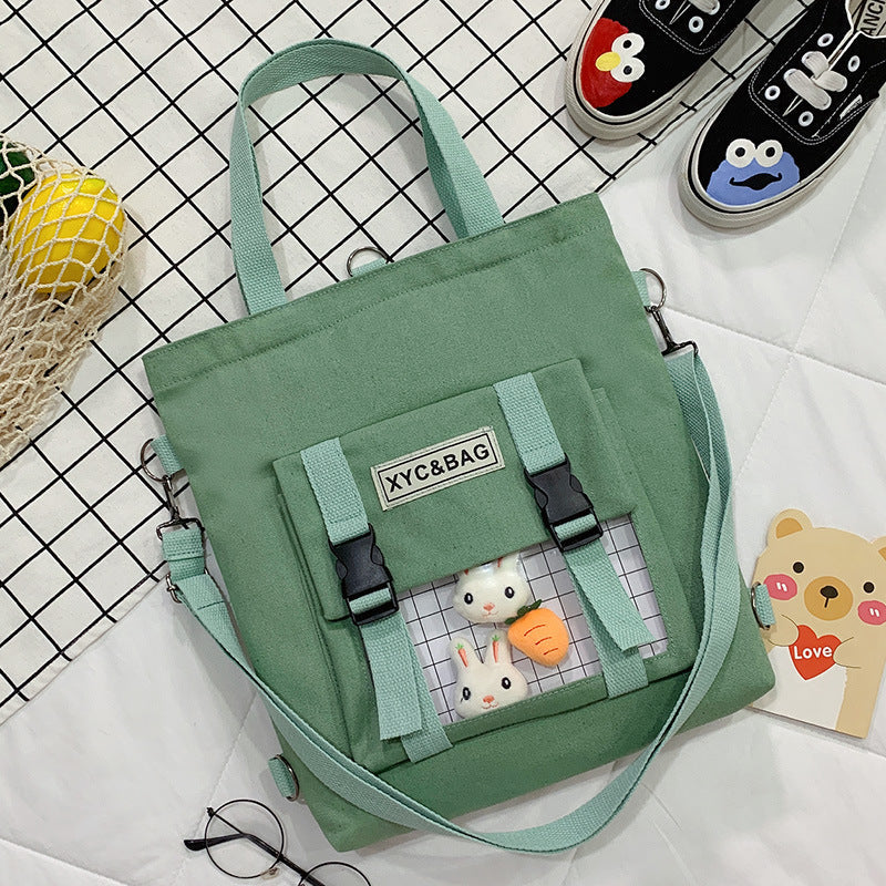 Transparent canvas shoulder bag with printed design by eprolo, featuring a spacious interior and stylish shoulder strap.