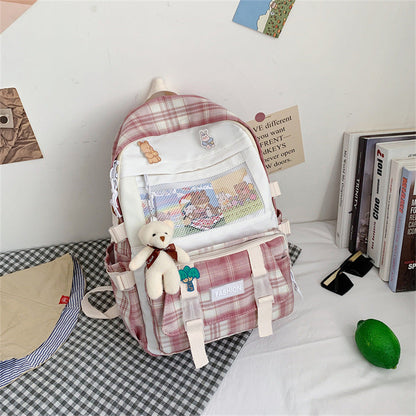 Eprolo Kareli Japon Tarzı sırt çantası with black and white checkered pattern, adjustable straps, and front pocket.