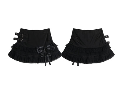 Eprolo low-rise bow mini skirt in black, featuring a stylish bow detail at the waist and a fitted silhouette.
