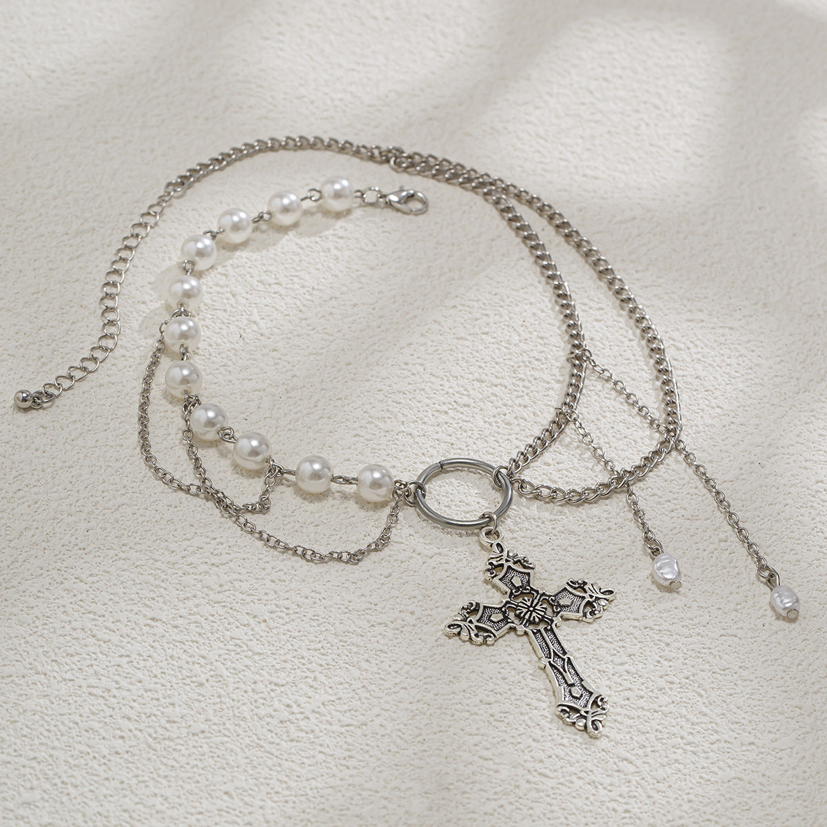 Gold Kristal detaylı haç kolye from eprolo, featuring sparkling crystal accents on a delicate chain.