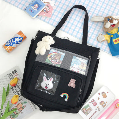 Large capacity canvas shoulder bag with bunny figure design from eprolo, featuring durable fabric and spacious interior for daily use.