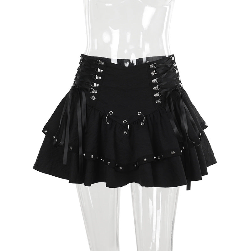 Metalik Punk mini etek by eprolo featuring shiny metallic fabric and a fitted waist, styled with a modern punk-inspired design.