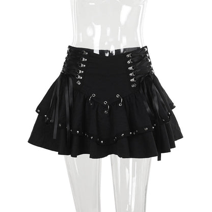 Metalik Punk mini etek by eprolo featuring shiny metallic fabric and a fitted waist, styled with a modern punk-inspired design.