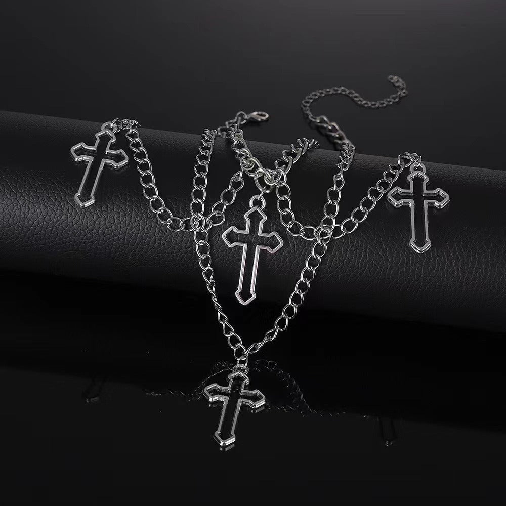 Eprolo Çok Katmanlı Haç Kolye with layered silver chains and intricate cross pendant, stylish jewelry accessory.