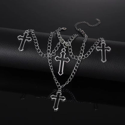 Eprolo Çok Katmanlı Haç Kolye with layered silver chains and intricate cross pendant, stylish jewelry accessory.