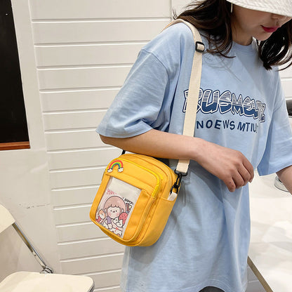 Eprolo Kore Tarzı Karikatürlü küçük omuz çantası with colorful cartoon design and adjustable shoulder strap.