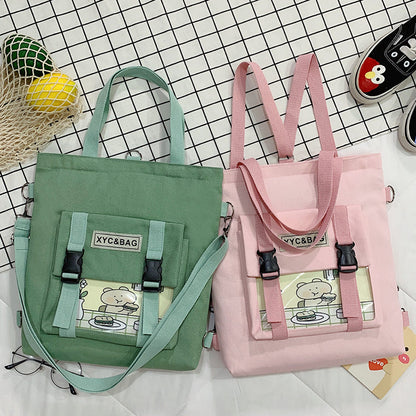 Transparent canvas shoulder bag with colorful printed design by eprolo, featuring a spacious main compartment and adjustable strap.
