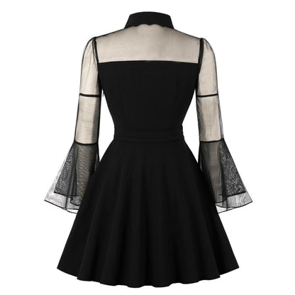 Eprolo black transparent mini dress with long sleeves and fitted silhouette, shown on a model.