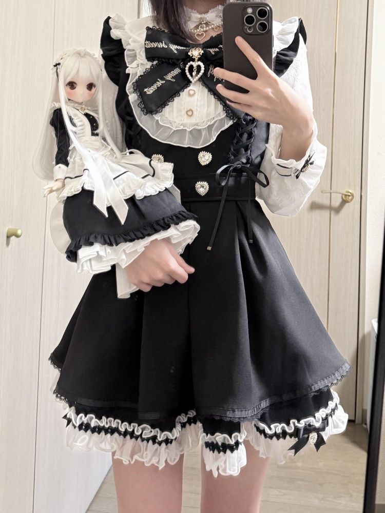 Shadora long-sleeve mini dress set with ruffled details, featuring a stylish, feminine design and vibrant fabric.