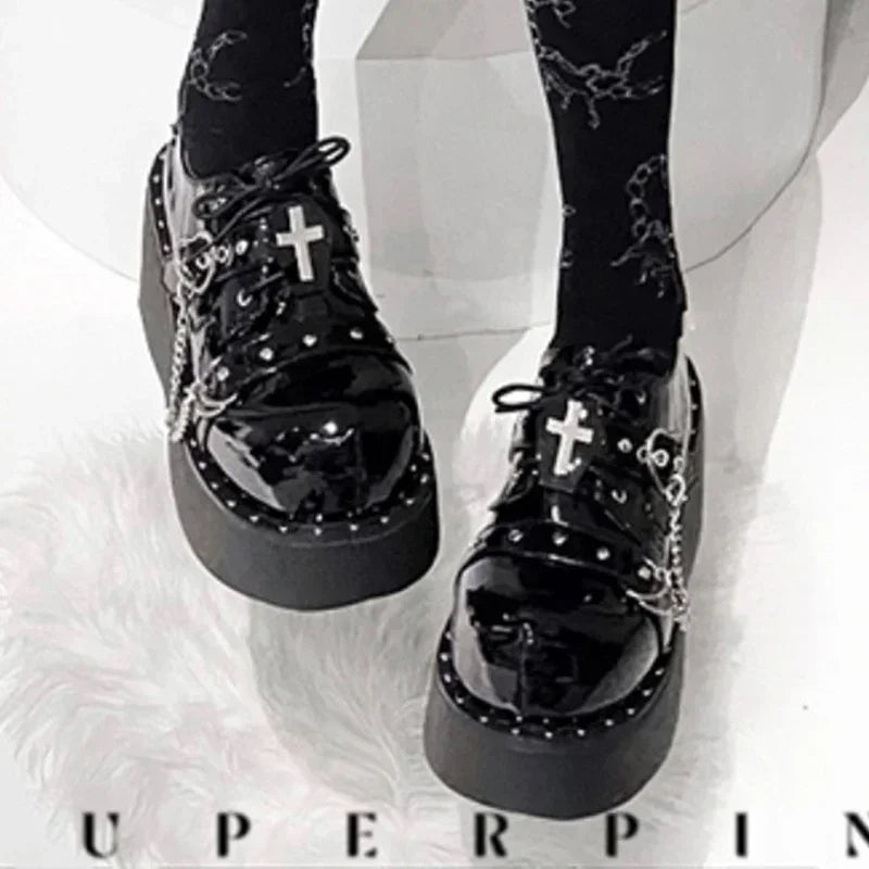Eprolo Mary Jane platform shoes with chain cross buckle and Lolita style, featuring a black leather upper and chunky heel.