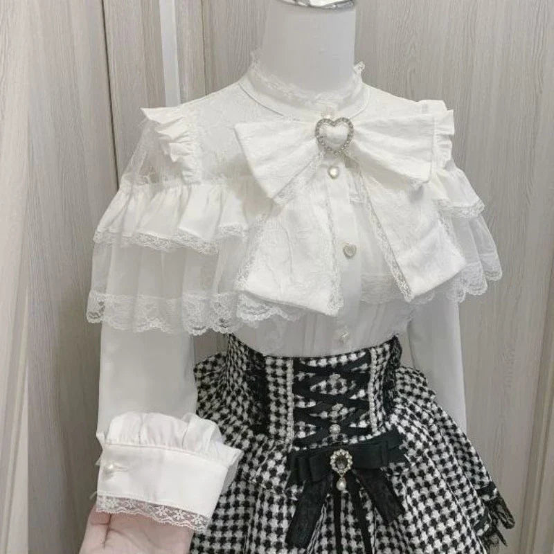 Shadora Jirai Kei Kawaii Dantel Lolita blouse featuring delicate lace details and a soft pastel color, stylish and cute fashion top.