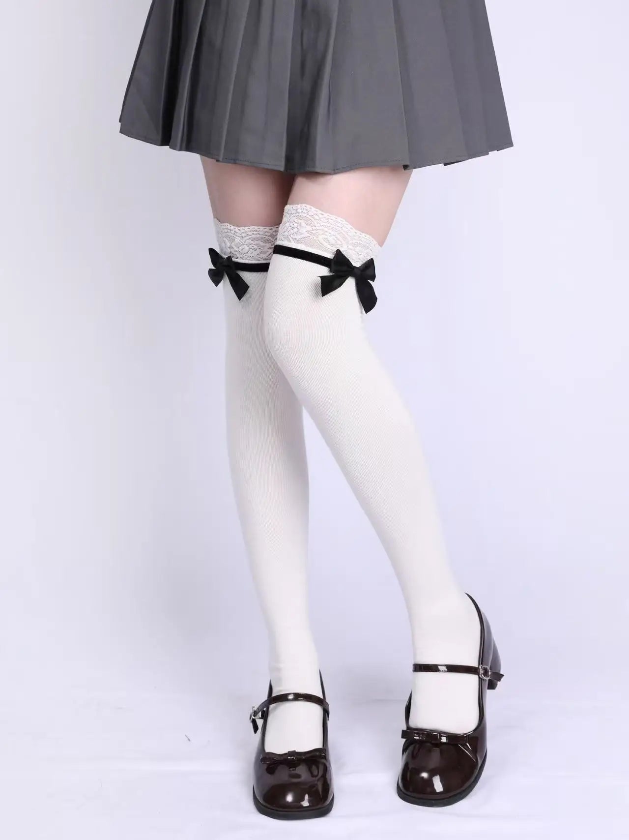 Eprolo Jirai Kei off-shoulder blouse and black skirt set, stylish fashion outfit with blouse and matching skirt on a model.