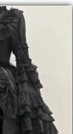 Black Victorian Gothic dress with ruffled details by Kat Kat Fırfırlı, featuring a vintage-inspired, elegant design.