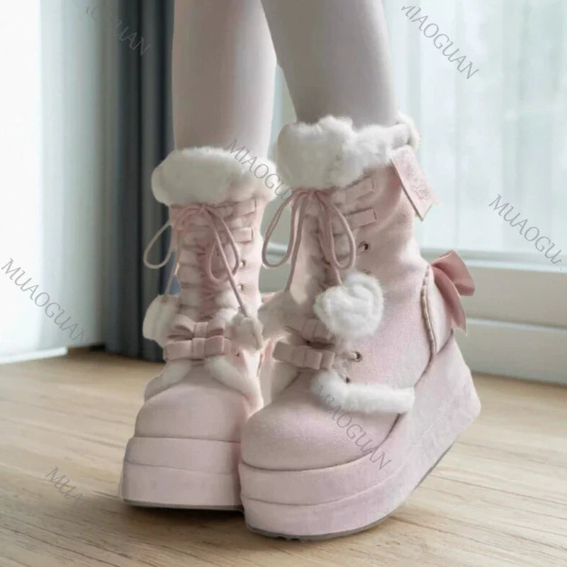 Eprolo fuzzy platform snow boots with bow detail, black faux fur lining, and sturdy sole for winter wear.