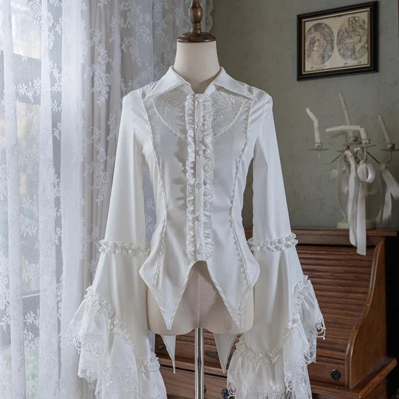 Black Gothic Victorian blouse with lace details and long sleeves from eprolo, featuring intricate feminine design.