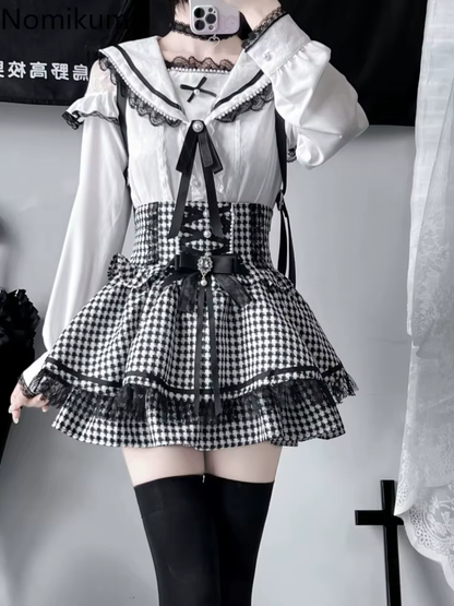 Eprolo Ekose yüksek bel fiyonklu mini etek in black with bow detail, showcasing its high waist and stylish plaid pattern.